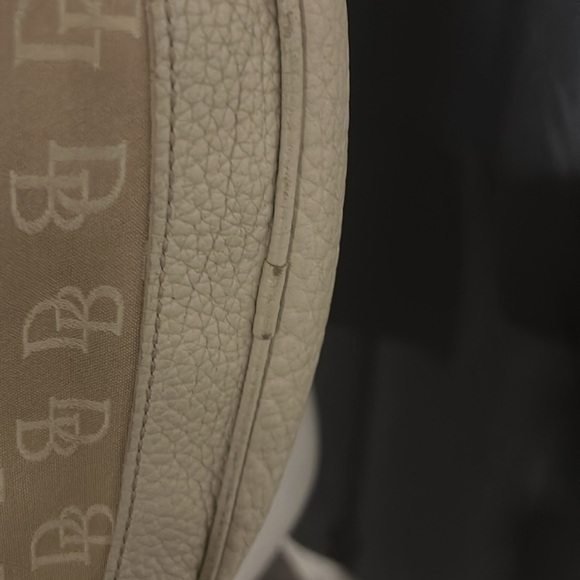 Dooney and Bourke vintage hobo purse in the color cream. - Picture 11 of 14